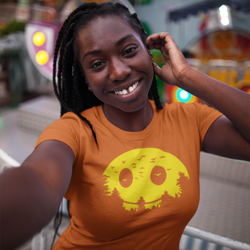 happy young customer with dreadlocks wearing a t shirt mockup while taking a selfie a16005